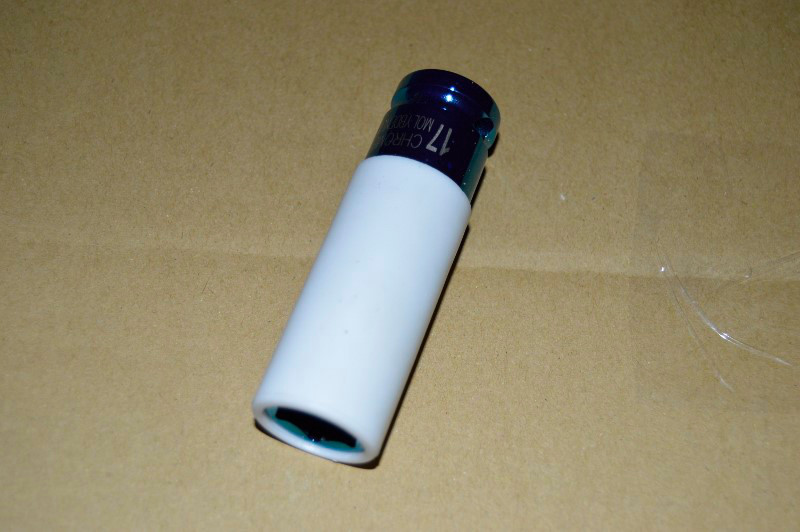 Wheel impact socket with plastic coating